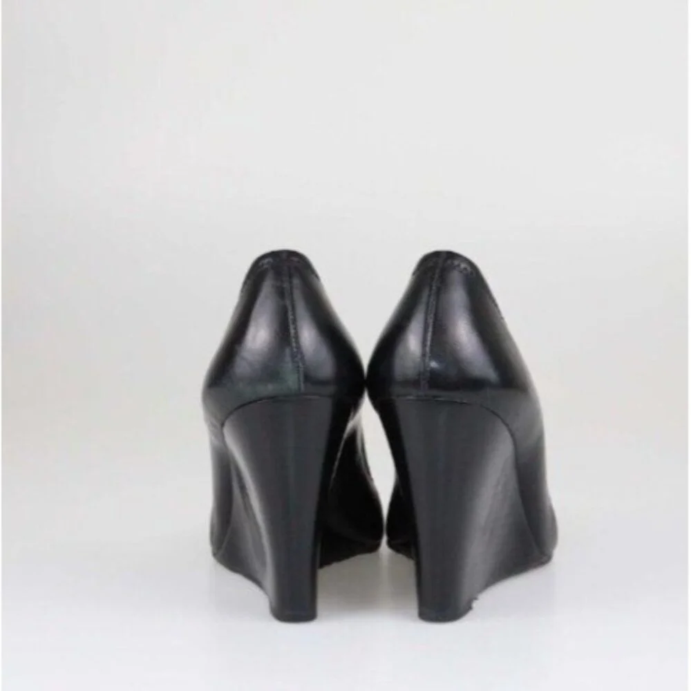 Tory Burch Black Leather Wedge Pumps with Gold Logo